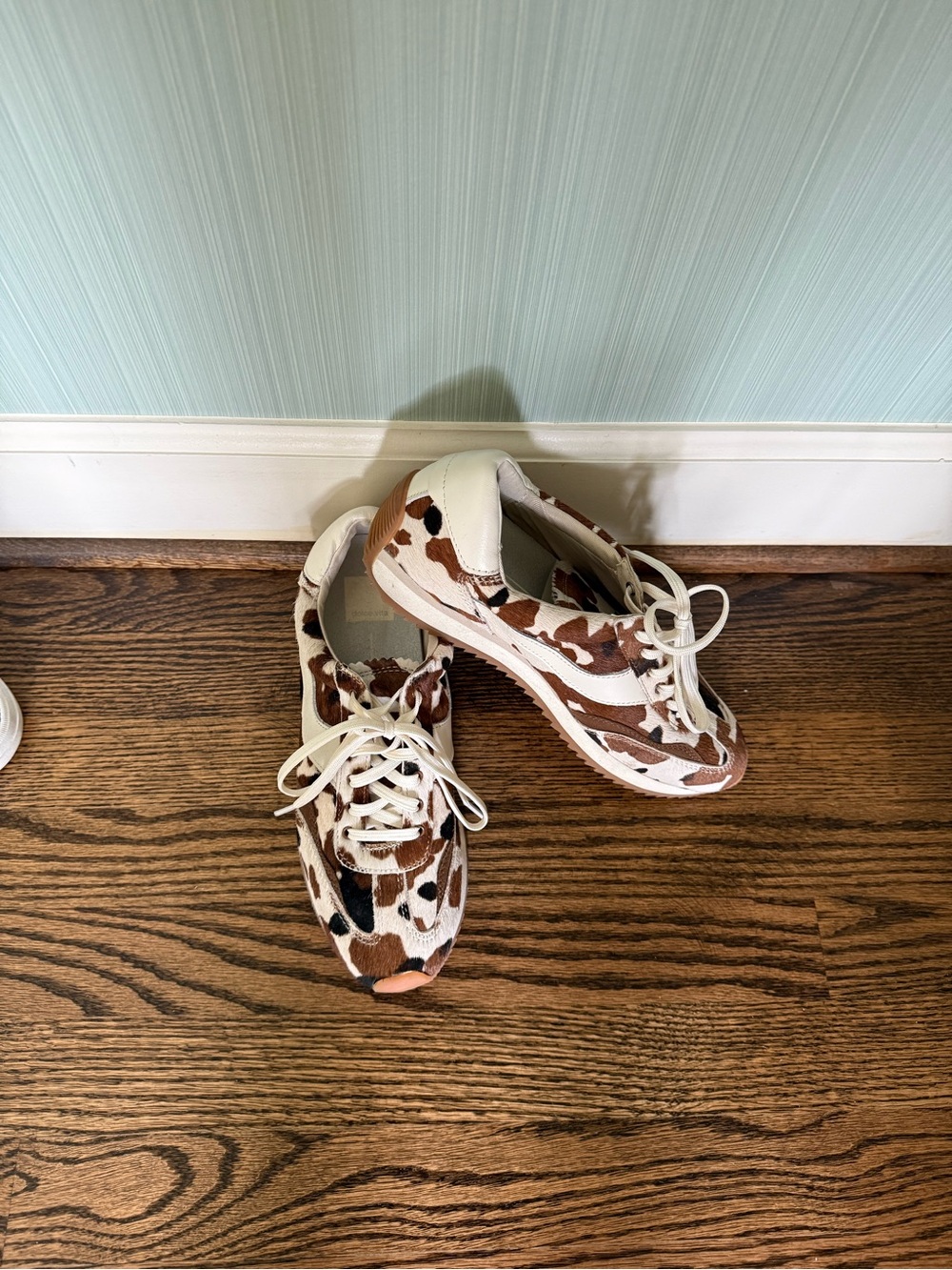 Dolce Vita Cow-Print Leather Sneakers in White & Brown